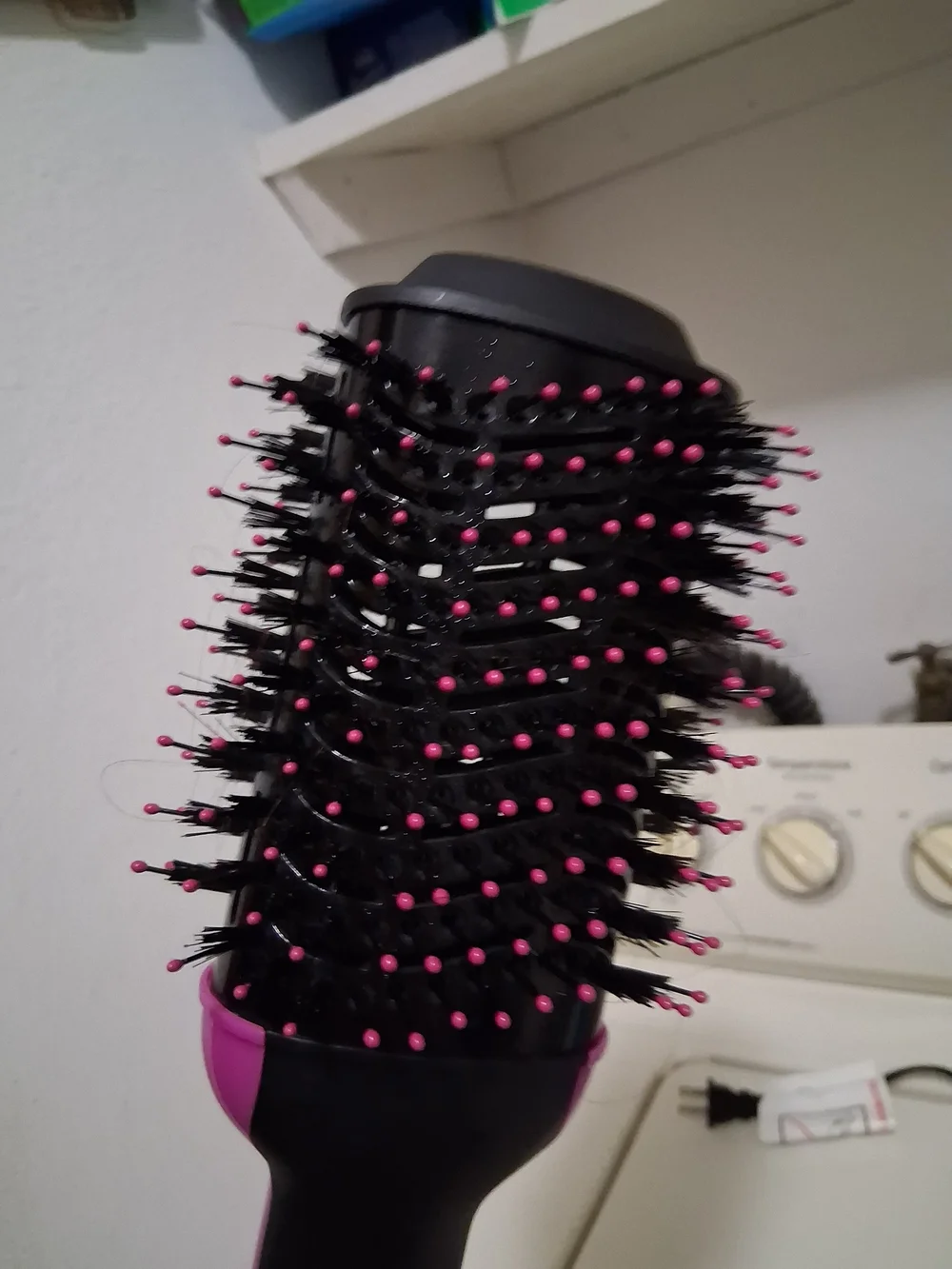 Pink and Black Hot Air Hair Brush Dryer And Various Styling Items